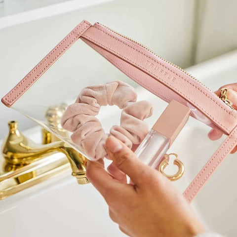 Truffle Clarity Clutch Mini in Blush, a sleek small clear pouch, perfect for everyday essentials