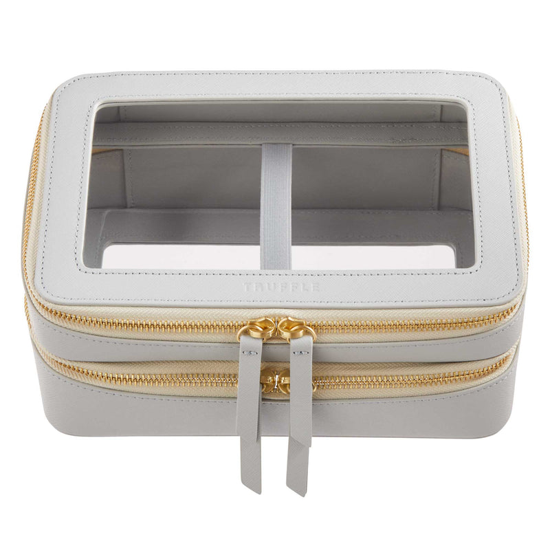 Truffle Clarity Jumbo Jetset Case in dove grey leather with two zip-around clear compartments.