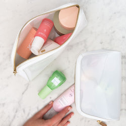 truffle vanity pouch set is a tinted plastic vanity pouch