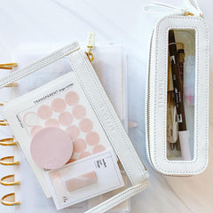 How Jen Mackintosh fills her Clarity Mini Jetset Case and Clarity Clutch Small in Chalk.