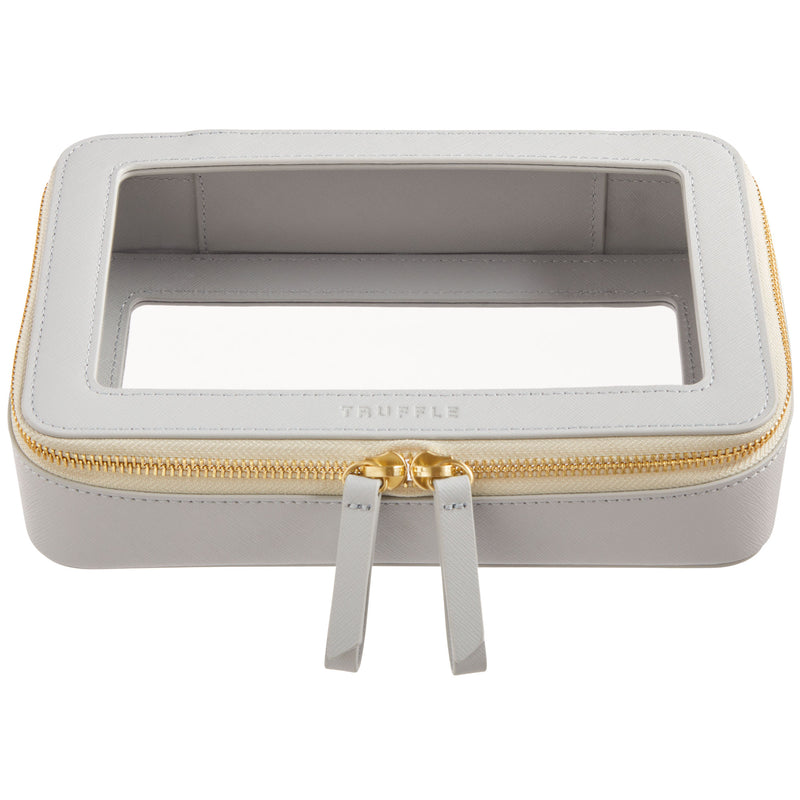 Truffle Clarity Jetset Large, luxe beauty/tech organization for travel. Clear TPU plastic trimmed in dove grey leather.
