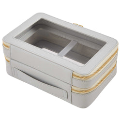 Back view of a Truffle Clarity Jumbo Jetset Case in dove grey leather with two zip-around clear compartments.