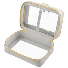 Side view of a Truffle Clarity Jumbo Jetset Case in dove grey leather with two zip-around clear compartments.