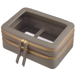 Side view of a Truffle Clarity Jumbo Jetset Case in toffee leather with two zip-around clear compartments.