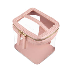 Side view of a Truffle Clarity Mini Train Case, trimmed in blush leather, perfect for small beauty, tech and everyday essentials.