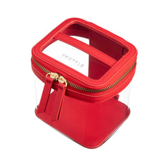 Side view of a Truffle Clarity Mini Train Case, trimmed in red leather, perfect for small beauty, tech and everyday essentials.