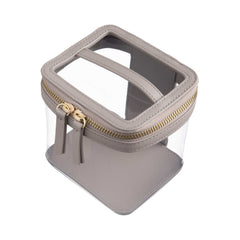 Side view of a Truffle Clarity Mini Train Case, trimmed in Toffee leather, perfect for small beauty, tech and everyday essentials.toffee-leather
