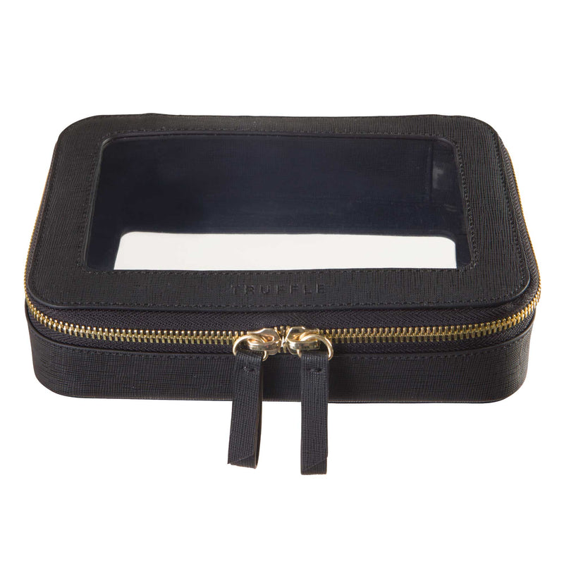 Truffle Clarity Jetset Case in black leather, TSA approved for travel-sized liquids. Multipurpose for tech or makeup organization. 
