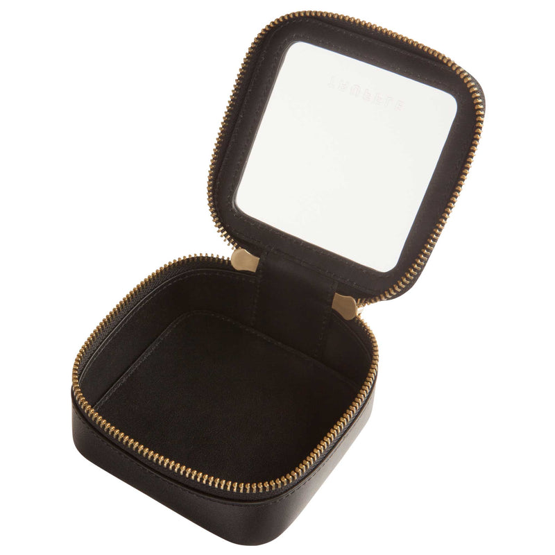 Open view of a Truffle Clarity Petite Case trimmed in Black leather, perfect for small essentials.
