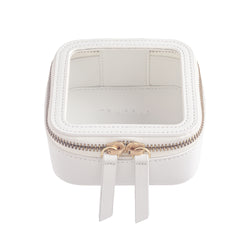 Truffle Clarity Petite Case trimmed in white leather, perfect for small essentials.