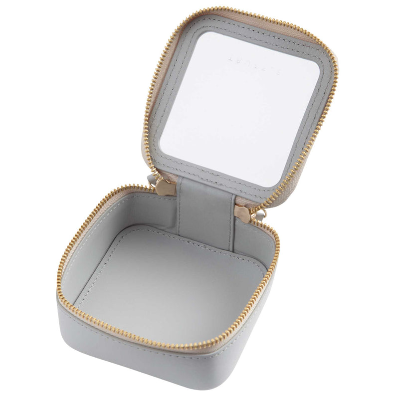 Open view of a Truffle Clarity Petite Case trimmed in dove grey leather, perfect for small essentials.
