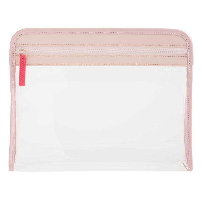 Side view of a clear Clarity Pouch Large, trimmed in pink nylon, ideal for large skin and haircare bottles. 