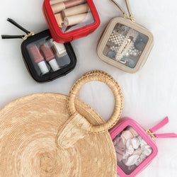 Truffle Clarity Petite Cases, packed with small beauty and jewelry. 